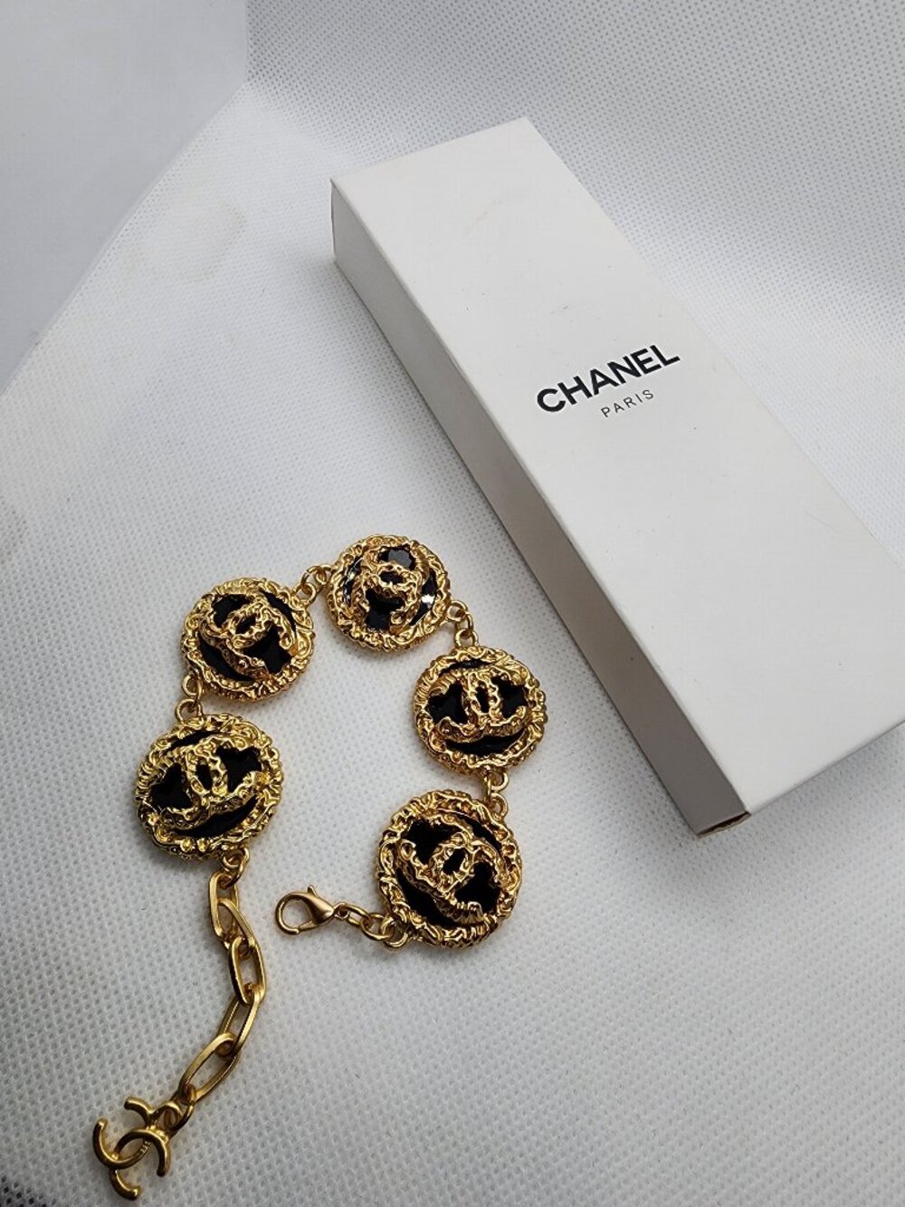 CHANEL Black and Gold Emblem Bracelet - Exclusive -